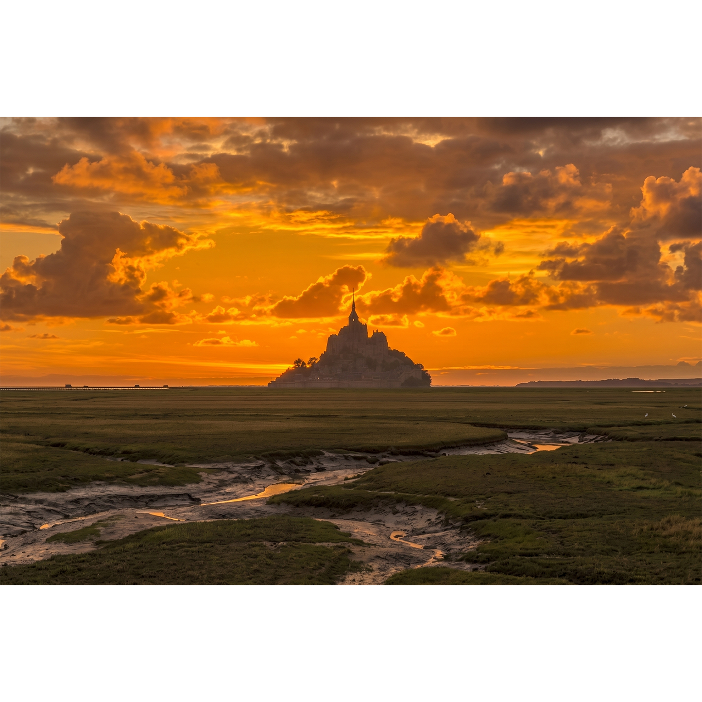 Mont Saint-Michel at Sunset - Silhouette Against a Fiery Golden Sky