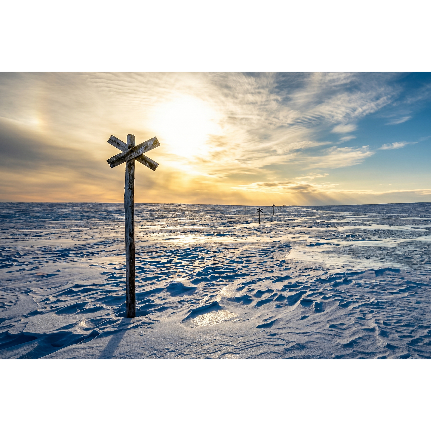 Arjeplog Fjället - Winter Trail Markers under a Radiant Sun