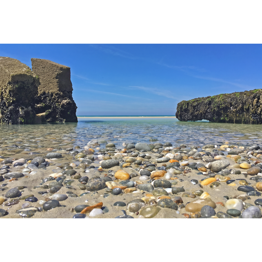 Brittany Beach Crystal Clear Shallow Waters and Pebbles