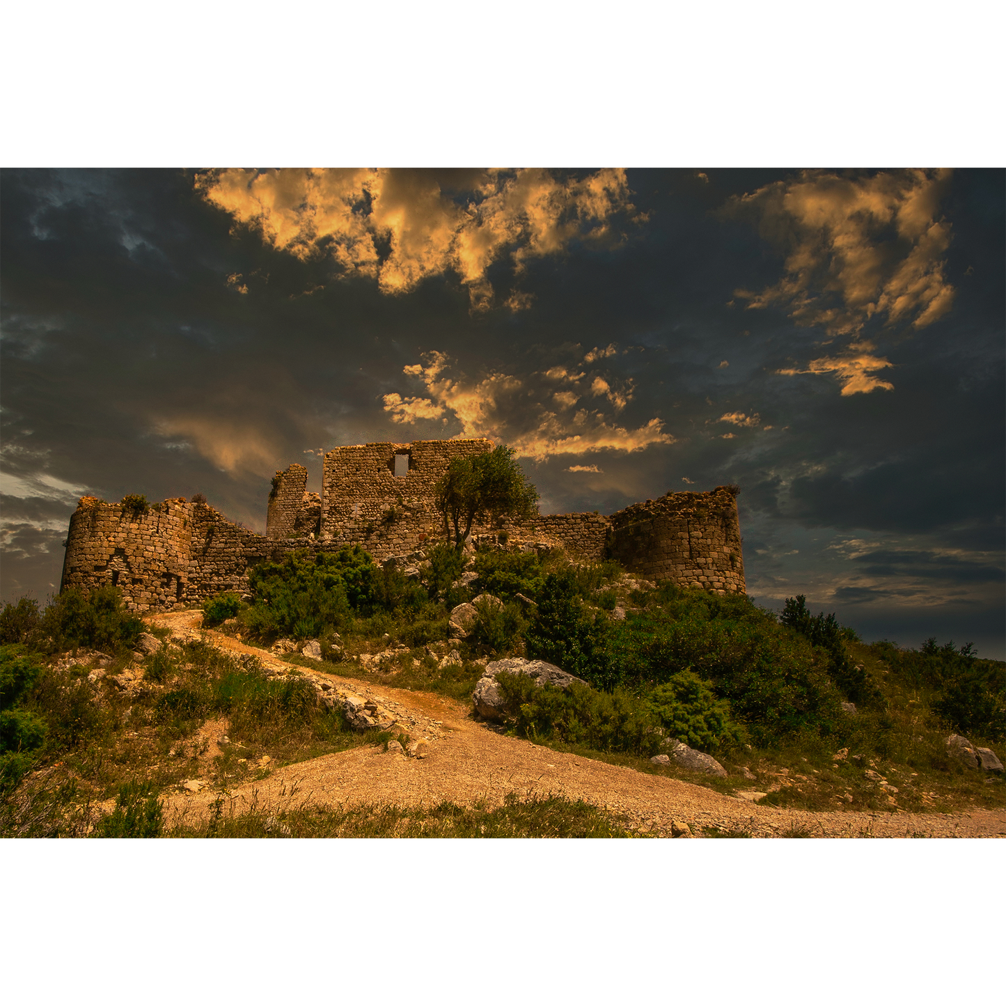 Château d'Aguilar - Dramatic Ruins Beneath Stormy Skies in Corbières-Fenouillèdes
